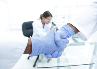 hand in the medical glove (handshake)