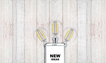 new ideas. telephone on the table and light bulbs. background for ideas - 181538931