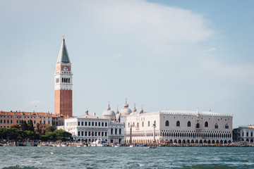 Fototapeta na wymiar Piazza San Marco with Campanile of St. Mark's Cathedral (Campanile di San Marco), Doge's Palace (Palazzo Ducale) wiew from Grand Canal, Venice, Italy