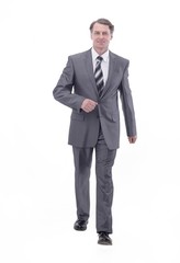 in all growth.a successful businessman, confidently striding forward.