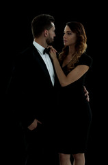 A young man and a woman looking each other