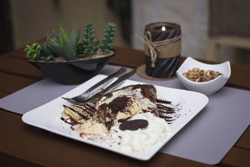 Sweet chocolate pancakes and ice cream romantic restaurant