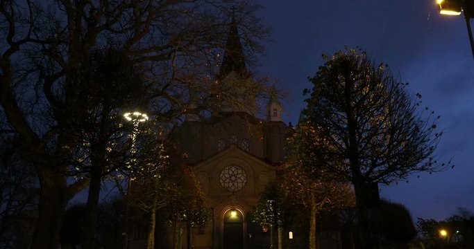 Snotorps Central church tilt from sky to entrance during rain