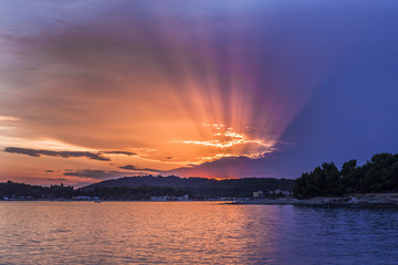 Sunset above sea golden summer sky