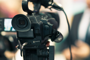 Camera at a media conference