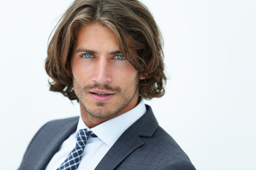 Close up portrait of an attractive young man in business suit