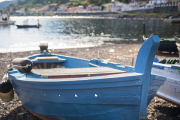 boats moored on shore