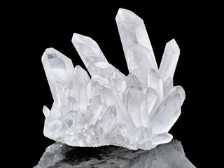 Pure Quartz Crystal cluster isolated on black background. Natural translucent crystal stone surface...