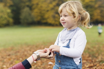 Mother and daughter in park