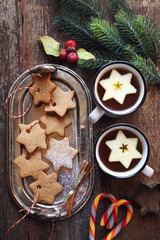 Christmas cinnamon cookies, sucking candy, two cups of tea and New Year decorations