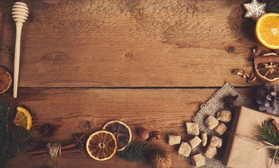 Ingredients for mulled wine on wooden board