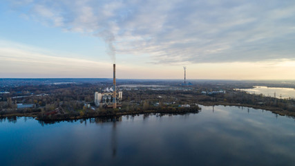 Garbage incineration plant. Waste incinerator plant with smoking smokestack. The problem of environmental pollution by factories.