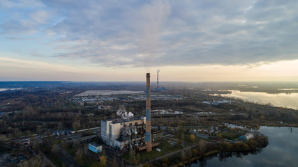 Garbage incineration plant. Waste incinerator plant with smoking smokestack. The problem of environmental pollution by factories.