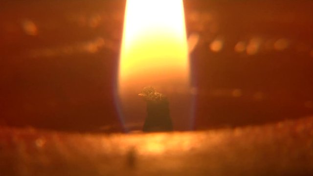 Extreme Close Up, Candle Wick Burns