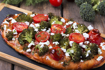 tart quiche with broccoli tomato and goat cheese