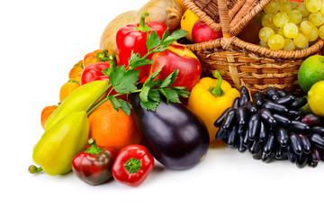 Basket with fresh fruits and vegetables isolated on a white background.