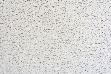 texture of a relief white tile pendant or hem of a ceiling