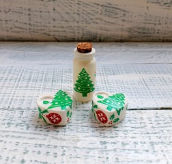 Aroma oil in a decorative bottle and gypsum stone for Christmas