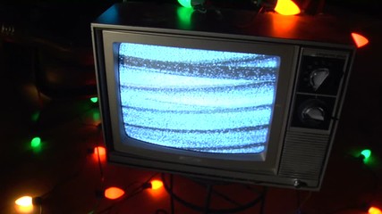 Christmas lights on vintage television static