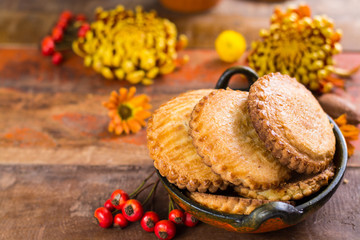 Autumn dessert, stuffed cookies on the wooden table, Thanksgiving food concept