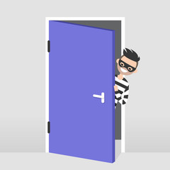 A thief trying to penetrate the house illegaly. Vector character wearing a black mask peeping out from behind the door. Flat illustration, clip art