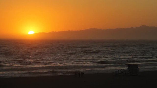 Wide, sunset timelapse over Venice Beach