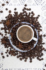 coffee cup with spreaded beans