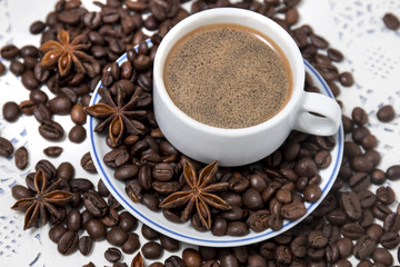 coffee cup with spreaded beans