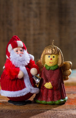 Christmas decoration, colorful angel girl candlelight and Santa Claus