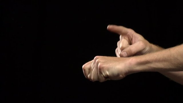 Close up, hands do magic trick
