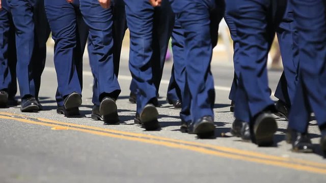 People march down road