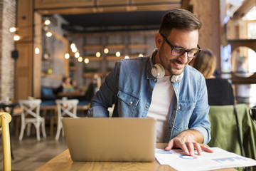 Fototapeta premium Freelancer at the coffee shop