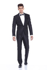 Fototapeta premium Figure, Business Man Stand in dark Blue Black Suit