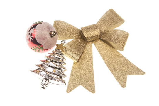 christmas balsl with gold ribbon bow on white background