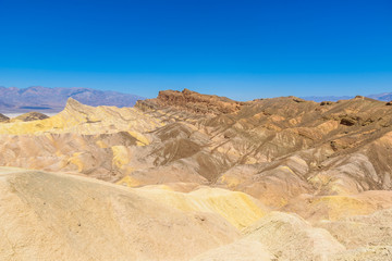 Fototapeta na wymiar Zabriskie Point - View to the colorful ridges and sand formation at Death Valley National Park, California, USA