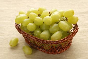 Green grape isolated on gray background    