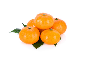 pile of whole fresh Tangerine or Mandarin orange on white background