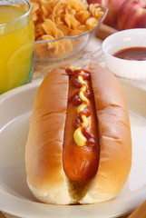Hot dog with mustard and ketchup