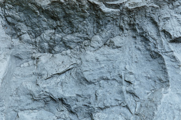 Aged gray stone macro, granite texture closeup