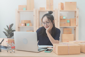 Young Asian Woman Working at home, Young business start up online seller owner,  Delivery Project, Woman with Online Business or SME Concept.