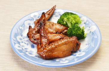 Grilled chicken wings  on a plate    