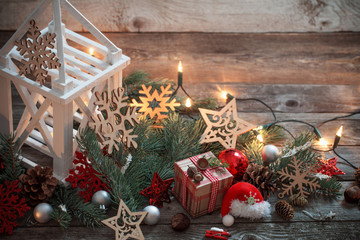 Christmas decoration with white lantern  on wooden background