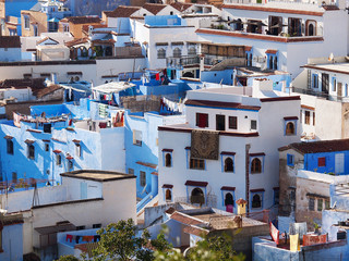 The gorgeous blue streets and blue-washed buildings of Chefchaouen, moroccan blue city- amazing palette of blue and white buildings