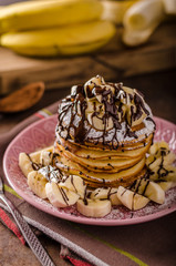 American pancakes with banana, chocolate