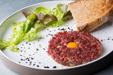 Tartar dish on a white plate