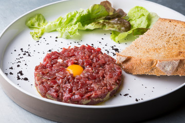 Tartar dish on a white plate
