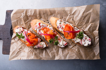Bruschetta sandwiches with salad