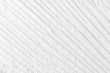 White abstract striped  plaster background.
