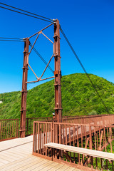 suspension bridge of the hills and wooded Okatse Canyon, Georgia