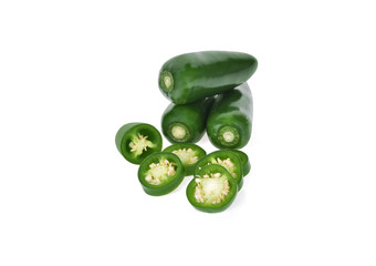 sliced green jalapeno peppers on white background